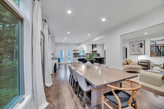 11260 Hidden Oaks Ct N, Champlin, MN 55316 - dining space featuring wood finished floors and recessed lighting