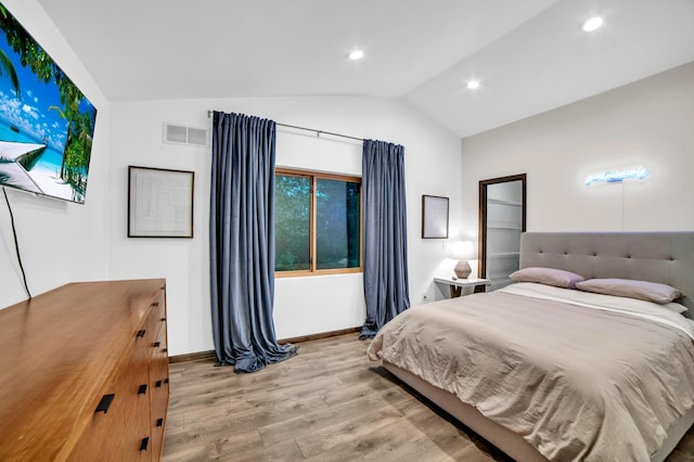 11260 Hidden Oaks Ct N, Champlin, MN 55316 - bedroom with lofted ceiling, wood finished floors, baseboards, and recessed lighting
