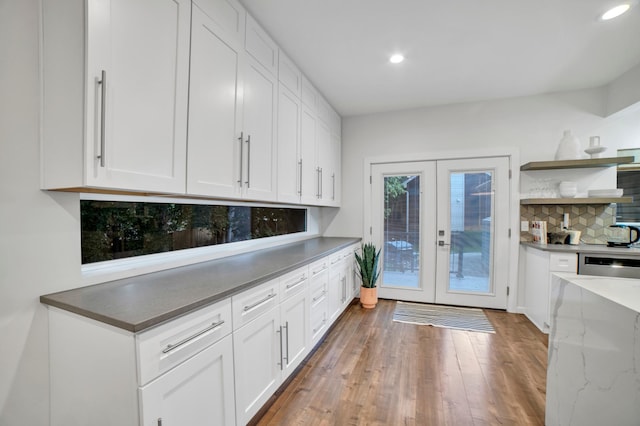 11260 Hidden Oaks Ct N, Champlin, MN 55316 - kitchen with french doors, tasteful backsplash, recessed lighting, wood finished floors, and white cabinetry