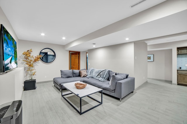 11260 Hidden Oaks Ct N, Champlin, MN 55316 - living room featuring light wood-type flooring, baseboards, and recessed lighting