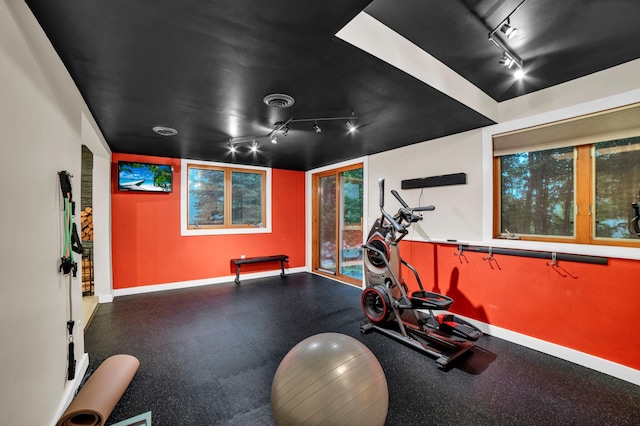 11260 Hidden Oaks Ct N, Champlin, MN 55316 - workout area featuring track lighting and baseboards