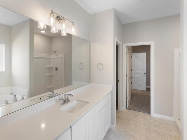 15981 Finale Ave N, Hugo, MN 55038 - bathroom with vanity, a shower, a tub to relax in, tile patterned floors, and a walk in closet