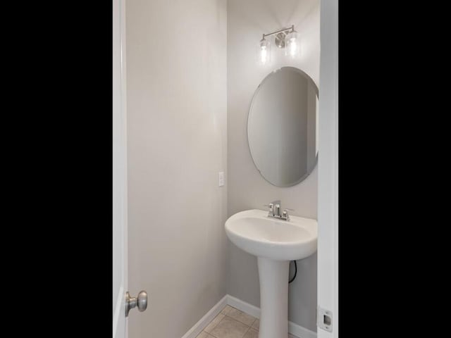 15981 Finale Ave N, Hugo, MN 55038 - bathroom with tile patterned floors and baseboards