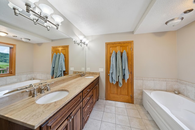 N1931 110th St, Union Twp, WI 54761 - bathroom with a bath, double vanity, tile patterned flooring, and a textured ceiling