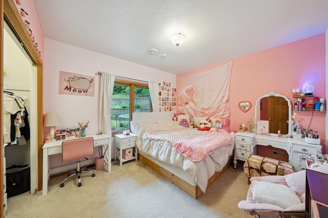 N1931 110th St, Union Twp, WI 54761 - bedroom with light colored carpet, a textured ceiling, and an office area