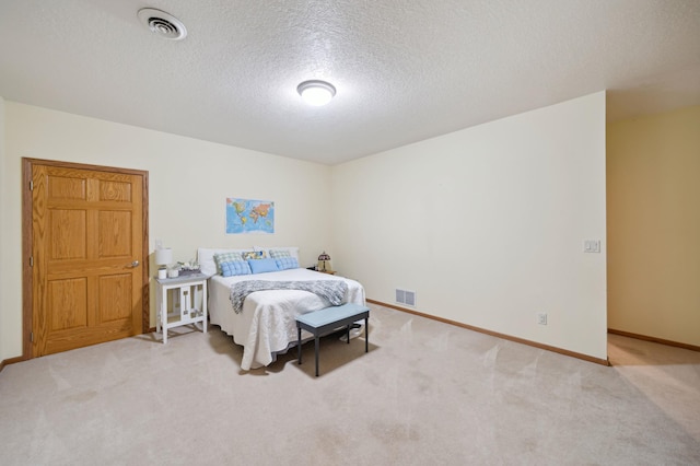 N1931 110th St, Union Twp, WI 54761 - carpeted bedroom featuring a textured ceiling and baseboards