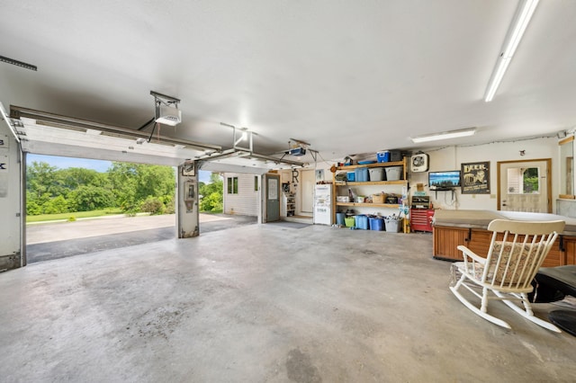 N1931 110th St, Union Twp, WI 54761 - garage featuring a garage door opener