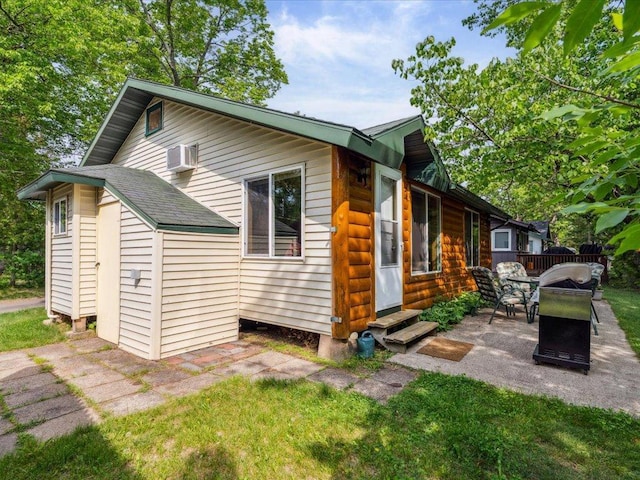 30202 Circle Dr, Breezy Point, MN 56472 - view of home's exterior featuring entry steps and a patio