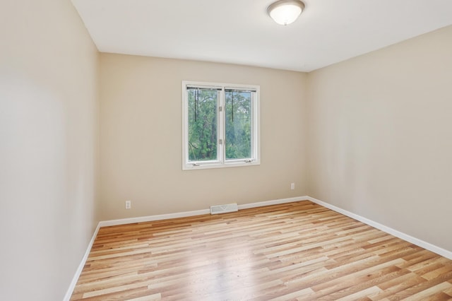 11600 Oberlin Rd, Minnetonka, MN 55305 - spare room with baseboards and wood finished floors
