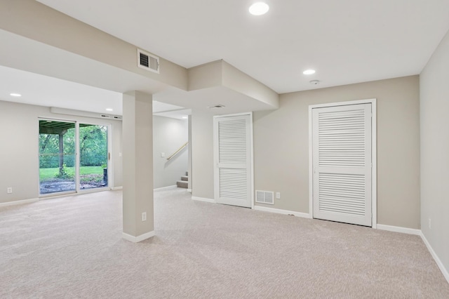 11600 Oberlin Rd, Minnetonka, MN 55305 - below grade area with light colored carpet, baseboards, recessed lighting, and stairs