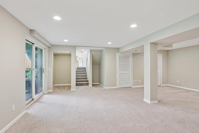 11600 Oberlin Rd, Minnetonka, MN 55305 - below grade area featuring light colored carpet, stairs, recessed lighting, and baseboards