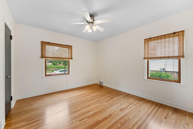 5257 27th Ave S, Minneapolis, MN 55417 - spare room featuring light wood-style floors, baseboards, and ceiling fan