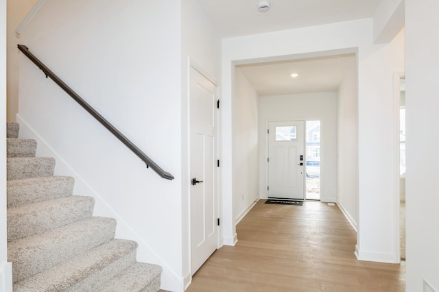 9887 49th St NE, Saint Michael, MN 55376 - entrance foyer with light wood-type flooring, stairway, baseboards, and recessed lighting