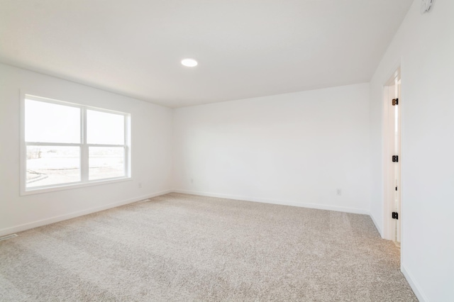 9887 49th St NE, Saint Michael, MN 55376 - spare room with carpet floors, baseboards, and recessed lighting