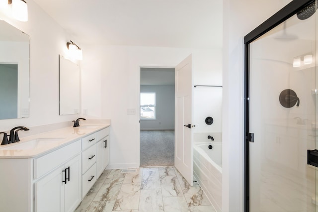 9887 49th St NE, Saint Michael, MN 55376 - full bathroom with a shower with shower door, double vanity, marble finish floors, baseboards, and a bath