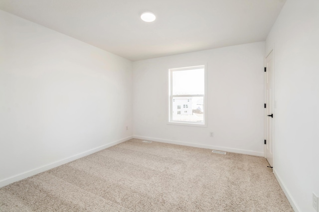 9887 49th St NE, Saint Michael, MN 55376 - unfurnished room featuring light carpet and baseboards