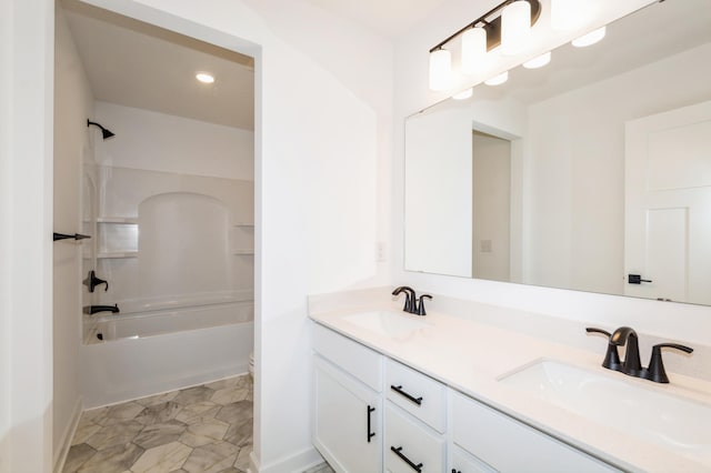 9887 49th St NE, Saint Michael, MN 55376 - full bathroom featuring double vanity, toilet,  shower combination, and recessed lighting
