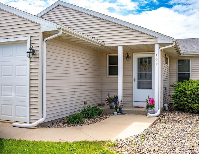 509 Clyde St, West Concord, MN 55985 - doorway to property with a garage