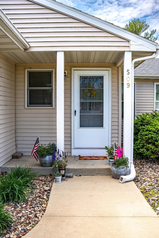 509 Clyde St, West Concord, MN 55985 - view of exterior entry featuring covered porch