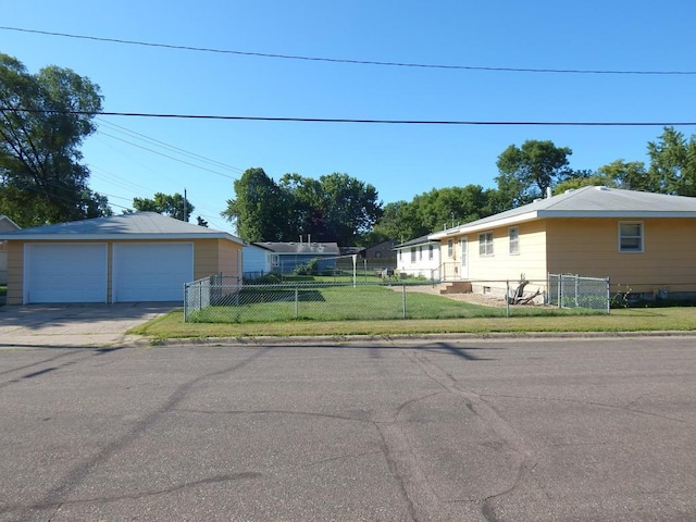 1052 36th Ave N, Saint Cloud, MN 56303 - view of front of property with a garage and an outdoor structure