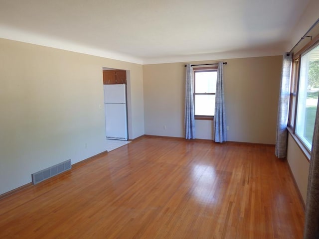 1052 36th Ave N, Saint Cloud, MN 56303 - empty room featuring light wood-type flooring