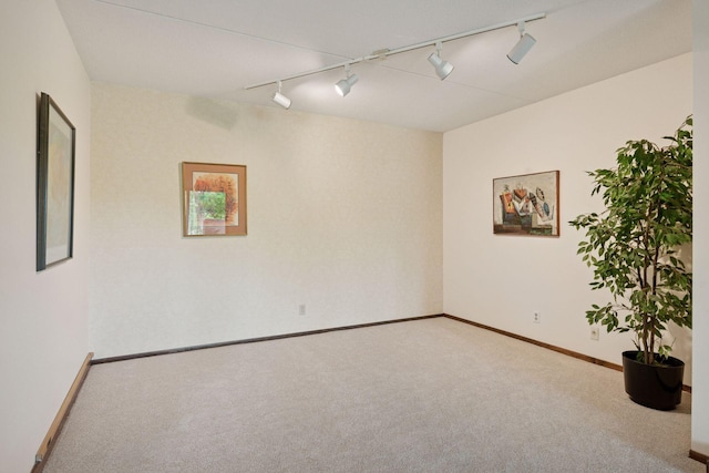 6670 Vernon Ave S Unit 301, Edina, MN 55436 - carpeted spare room featuring rail lighting and baseboards