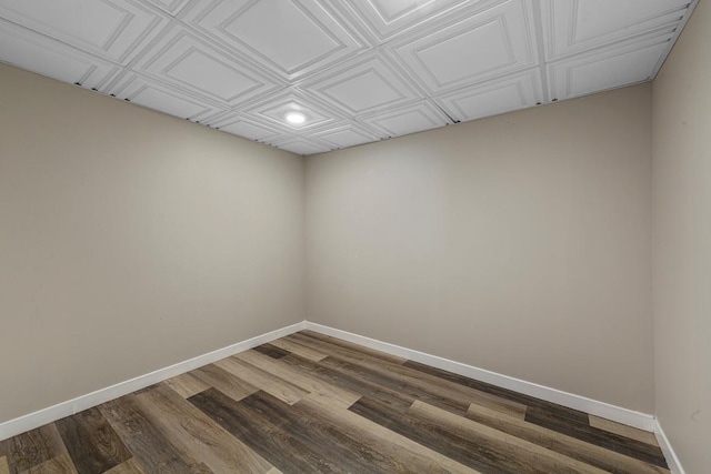 2939 Linden Ave, Slayton, MN 56172 - spare room featuring baseboards, dark wood-style floors, an ornate ceiling, and recessed lighting