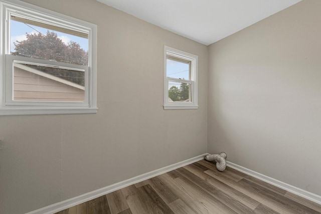 2939 Linden Ave, Slayton, MN 56172 - unfurnished room with wood finished floors and baseboards