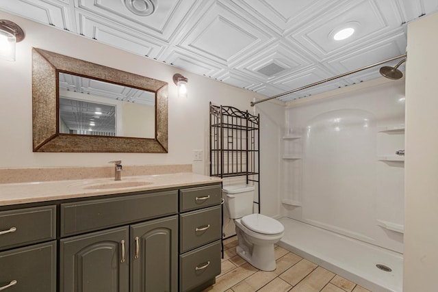 2939 Linden Ave, Slayton, MN 56172 - bathroom with an ornate ceiling, a shower, toilet, and vanity