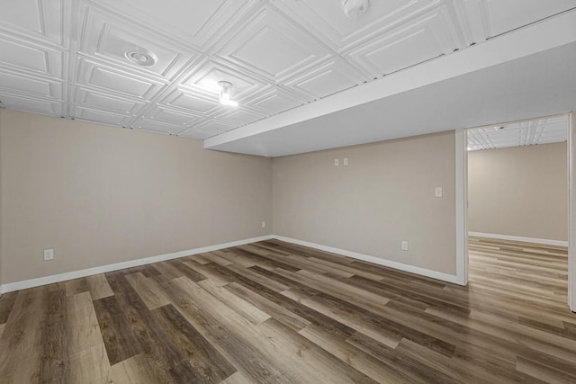 2939 Linden Ave, Slayton, MN 56172 - finished below grade area featuring an ornate ceiling, wood finished floors, and baseboards