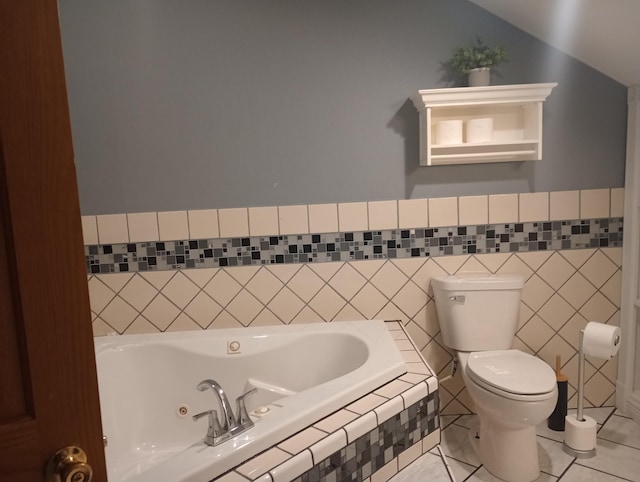 232 2nd St NW, Menahga, MN 56464 - full bath featuring a tub with jets, tile patterned flooring, and lofted ceiling
