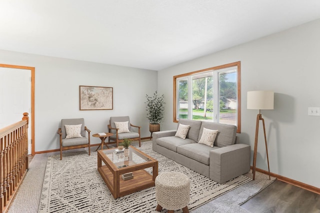 11001 Quincy Blvd NE, Blaine, MN 55434 - living area with baseboards and light wood finished floors