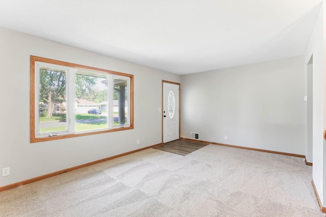 11001 Quincy Blvd NE, Blaine, MN 55434 - carpeted empty room with baseboards