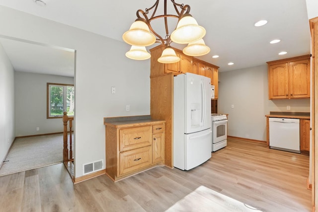 11001 Quincy Blvd NE, Blaine, MN 55434 - kitchen with white appliances, light wood finished floors, baseboards, recessed lighting, and pendant lighting