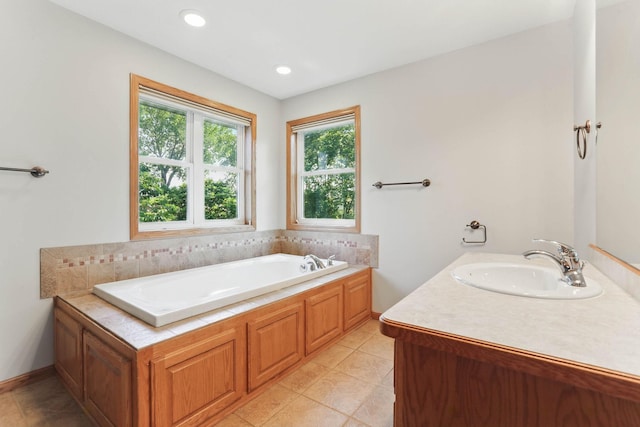 11001 Quincy Blvd NE, Blaine, MN 55434 - bathroom with a bath, vanity, tile patterned flooring, and recessed lighting