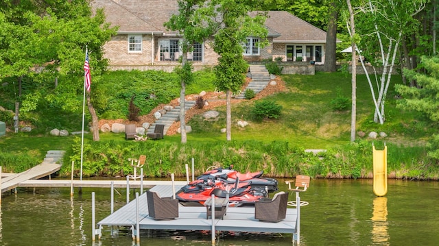 8821 Interlachen Rd, Lake Shore, MN 56468 - dock area featuring a water view, a lawn, and stairs