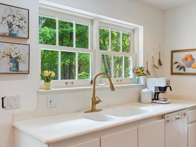 8821 Interlachen Rd, Lake Shore, MN 56468 - kitchen featuring dishwasher, light countertops, and white cabinets