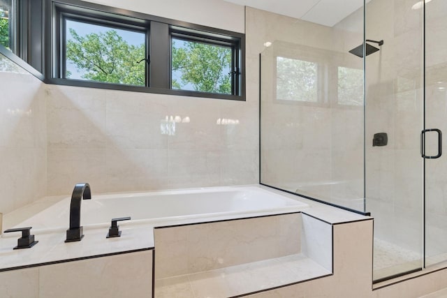 3850 Lone Cedar Ln, Chanhassen, MN 55318 - bathroom featuring a shower stall and a bath