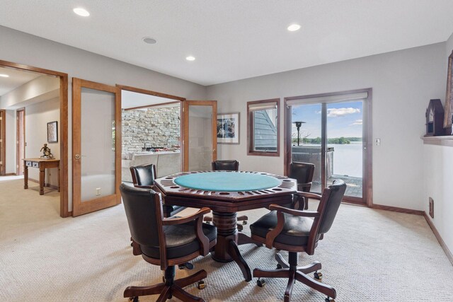 3850 Lone Cedar Ln, Chanhassen, MN 55318 - rec room with light colored carpet, recessed lighting, a desk, and baseboards