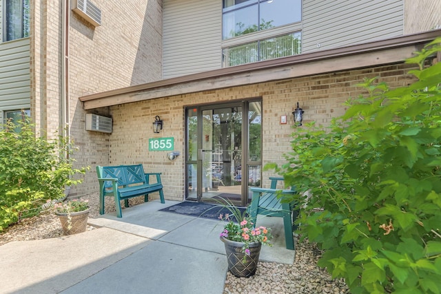 1855 Silver Bell Rd Unit 120, Eagan, MN 55122 - view of exterior entry featuring brick siding