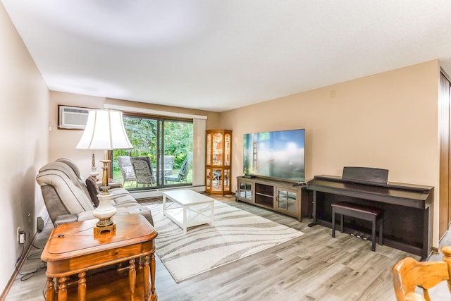 1855 Silver Bell Rd Unit 120, Eagan, MN 55122 - living area with a wall unit AC and wood finished floors