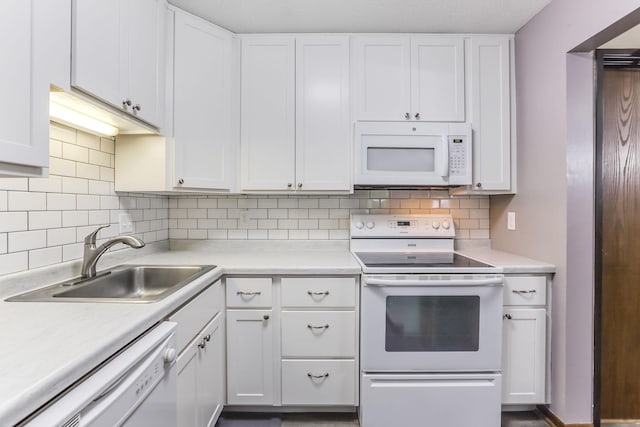1855 Silver Bell Rd Unit 120, Eagan, MN 55122 - kitchen with white appliances, light countertops, tasteful backsplash, and white cabinets