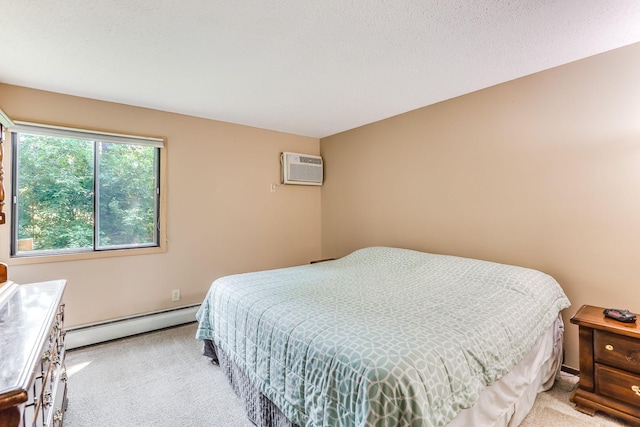 1855 Silver Bell Rd Unit 120, Eagan, MN 55122 - bedroom with a baseboard heating unit, light colored carpet, and an AC wall unit