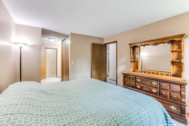 1855 Silver Bell Rd Unit 120, Eagan, MN 55122 - bedroom featuring a textured ceiling