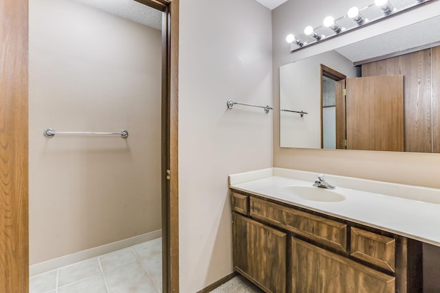 1855 Silver Bell Rd Unit 120, Eagan, MN 55122 - bathroom with vanity and baseboards