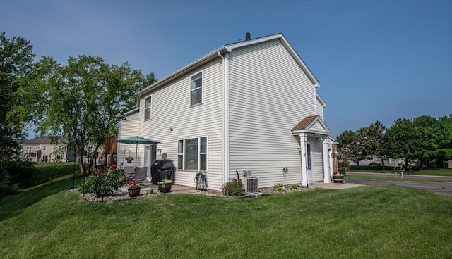 15608 Fjord Ave, Apple Valley, MN 55124 - back of property with a yard and central air condition unit
