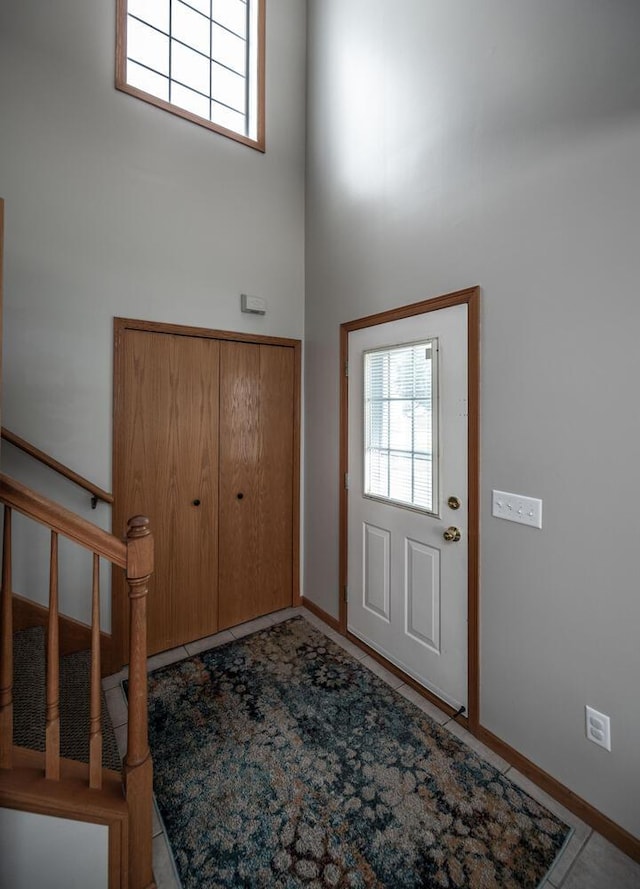 15608 Fjord Ave, Apple Valley, MN 55124 - entrance foyer featuring a high ceiling, stairs, and baseboards