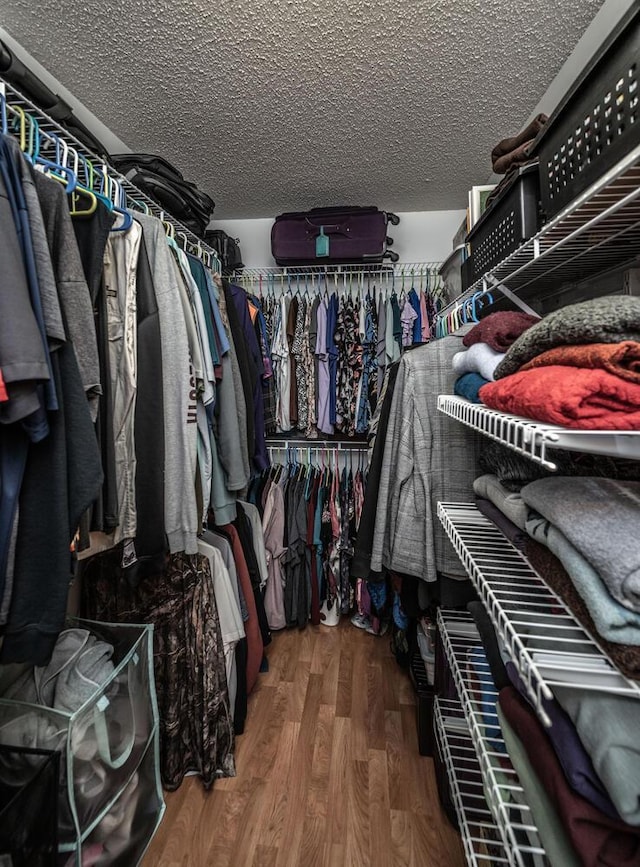 15608 Fjord Ave, Apple Valley, MN 55124 - walk in closet featuring wood finished floors