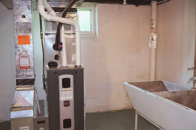 145 Robie St W, Saint Paul, MN 55107 - utilities with a sink and heating unit