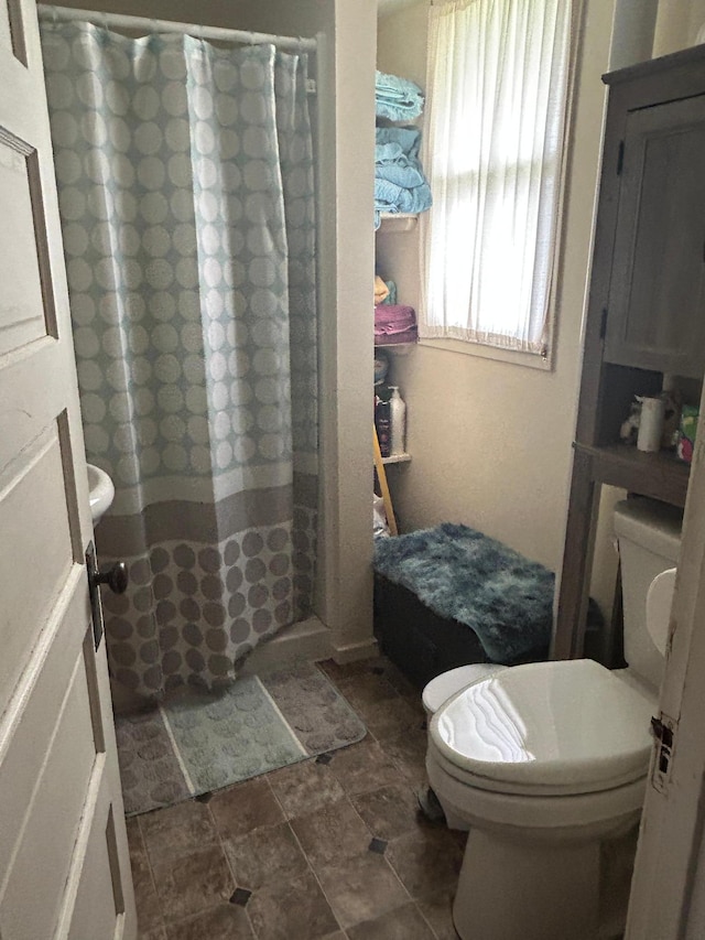 207 Cook St, Palisade, MN 56469 - bathroom with stone finish flooring and a shower with shower curtain